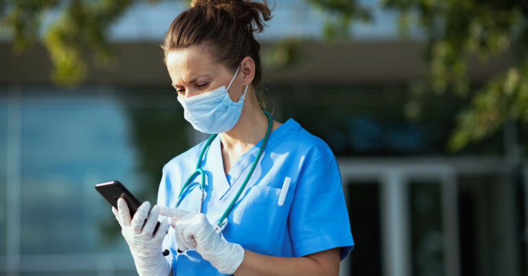 nurse-watching at phone